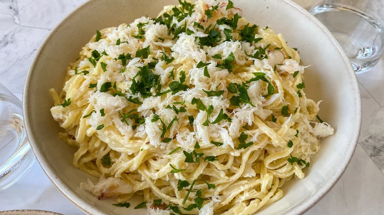 Pasta with crab in a bowl