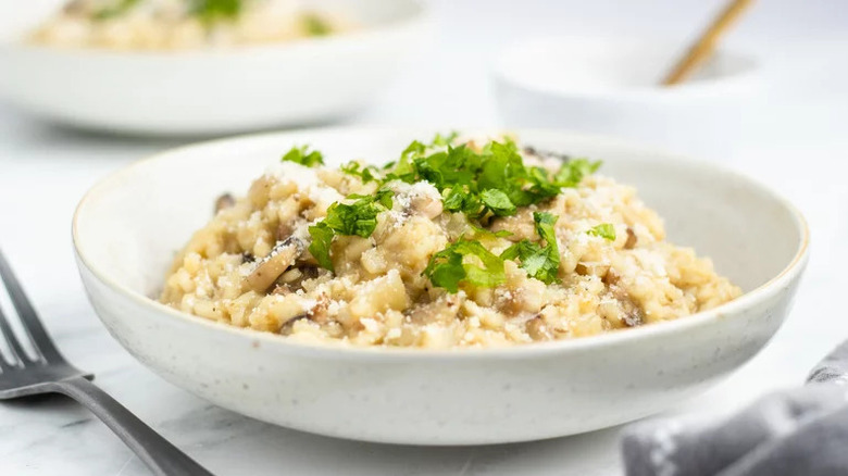 two bowls of mushroom risotto