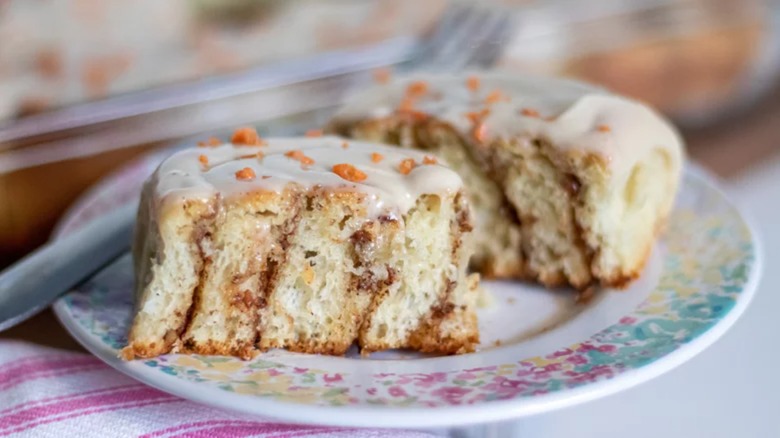 Cross-section of carrot cinnamon roll on plate