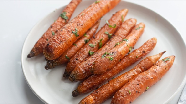 Plate of roasted whole carrots