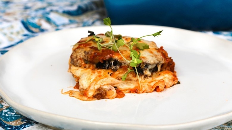 eggplant parmesan on white plate