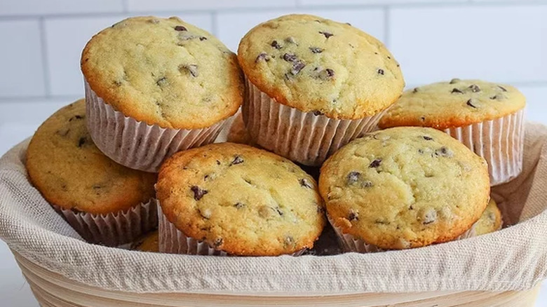 Basket of chocolate chip muffins in paper liners