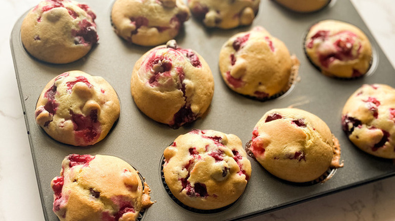 Baked cranberry muffins in muffin tin