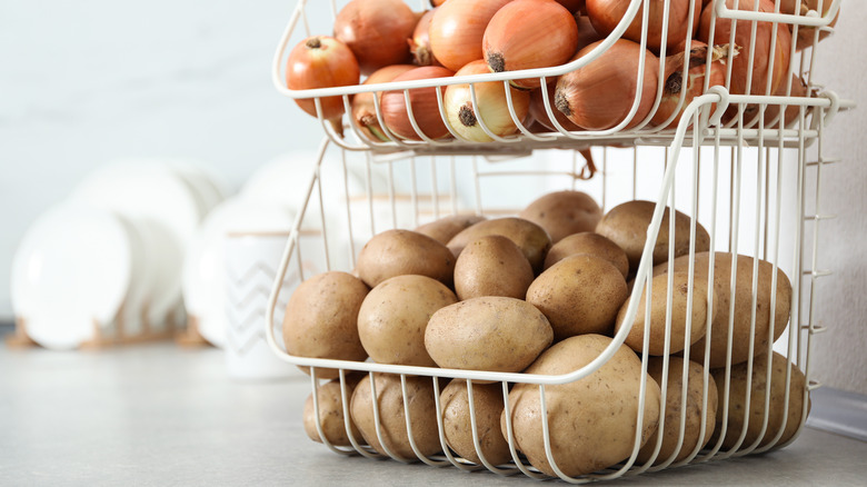 potatoes and onions in wire basket