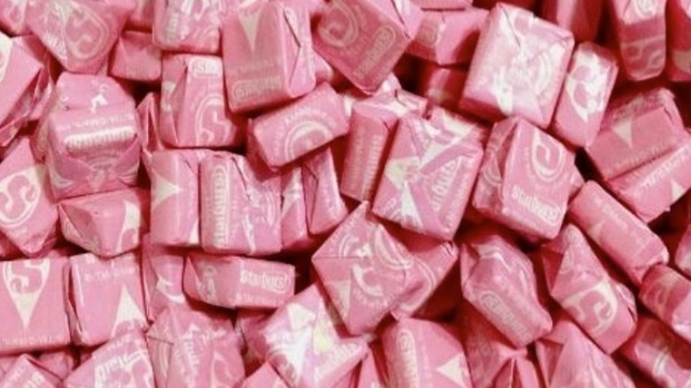 A big pile of pink Starbursts