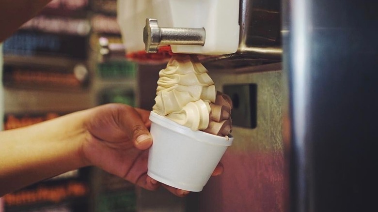 Rockie's Frozen Yogurt coming out of dispenser