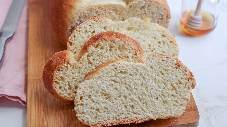 sliced bread on wooden board