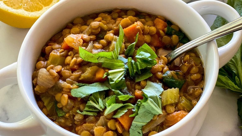 lentil soup in white bowl