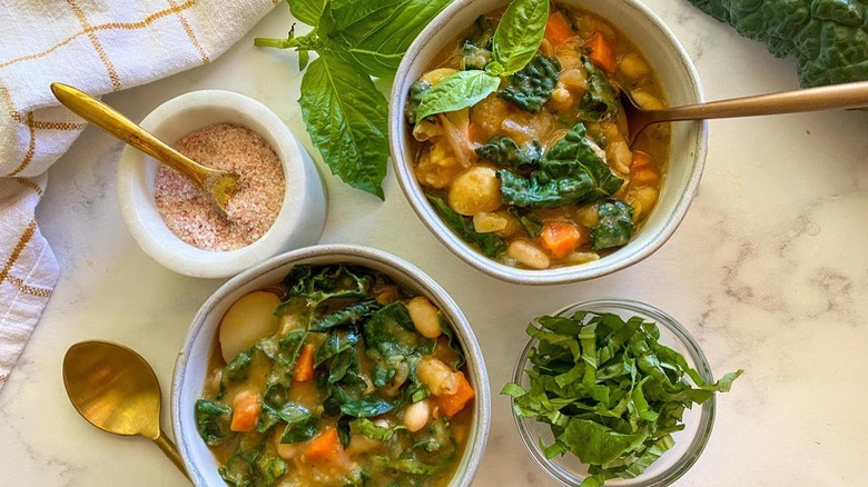 vegetable soup in white bowls