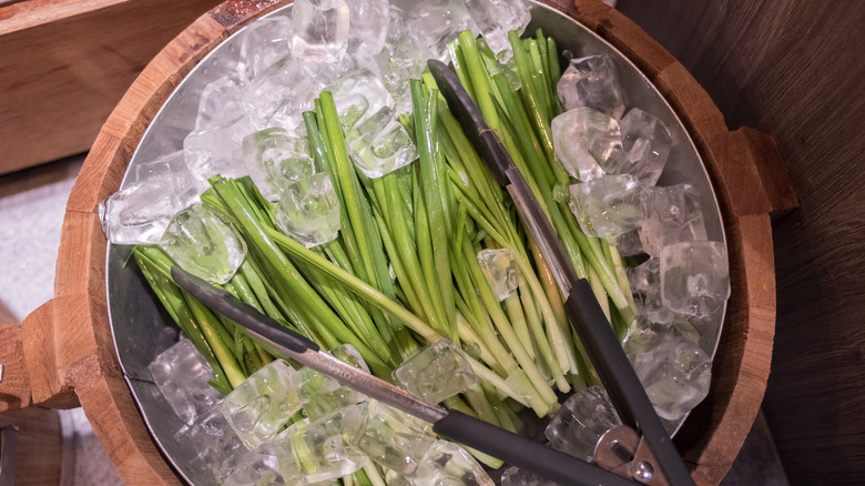 green onions on ice