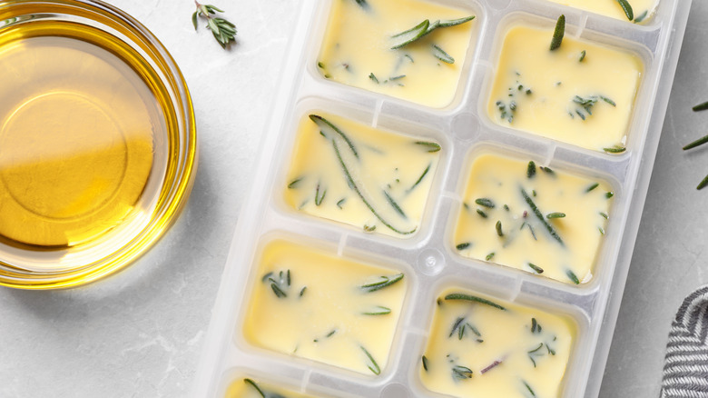 herbs frozen in olive oil and olive oil