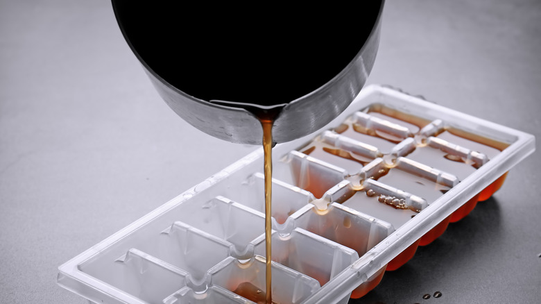 ice cube tray and pan and liquid