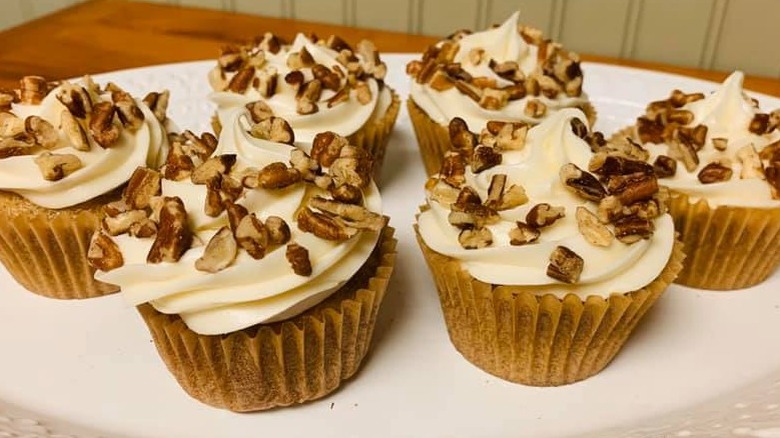 Tray of hummingbird cupcakes with pecans