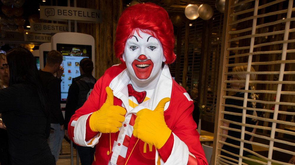 Ronald McDonald giving double thumbs-up