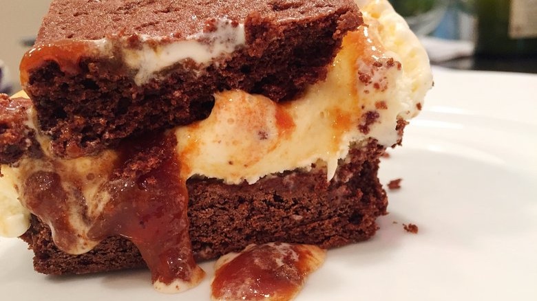 close up of chocolate, candy, and caramel ice cream sandwich