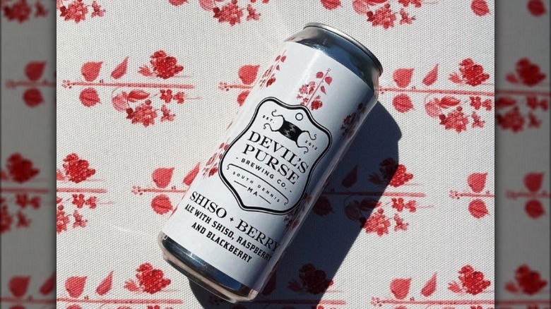 Devil's Purse Shisho Berry beer can on flower fabric