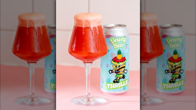 Dewey Beer Company Thrills can glass pink table