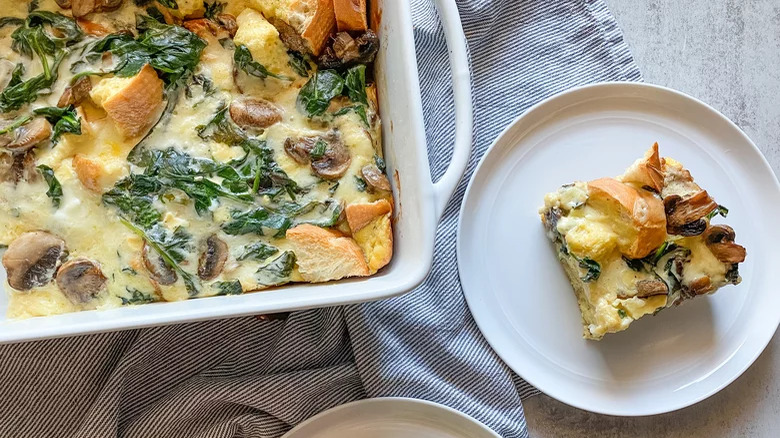 casserole dish of spinach and mushroom egg strata