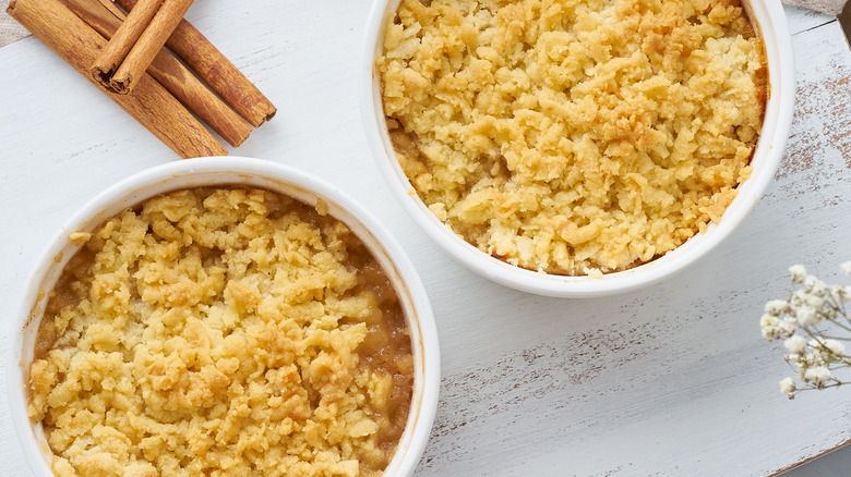 two pans of apple crumble