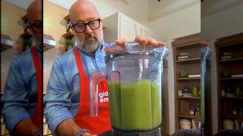 Andrew Zimmern with blender