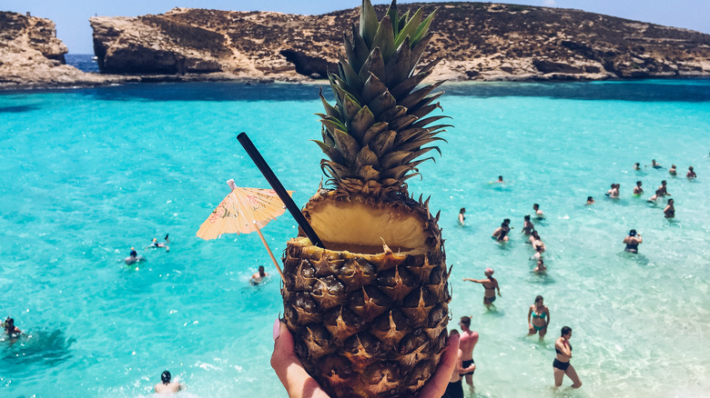 Cocktail served in pineapple shell