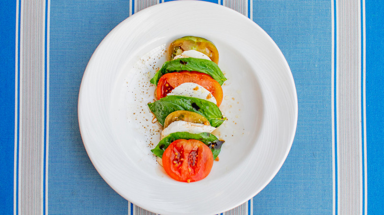 Mozzarella, tomato, and basil layers