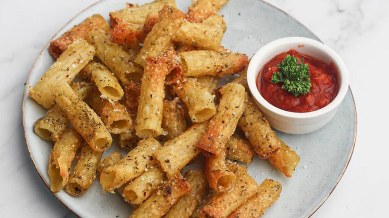 Crispy seasoned pasta noodles on plate