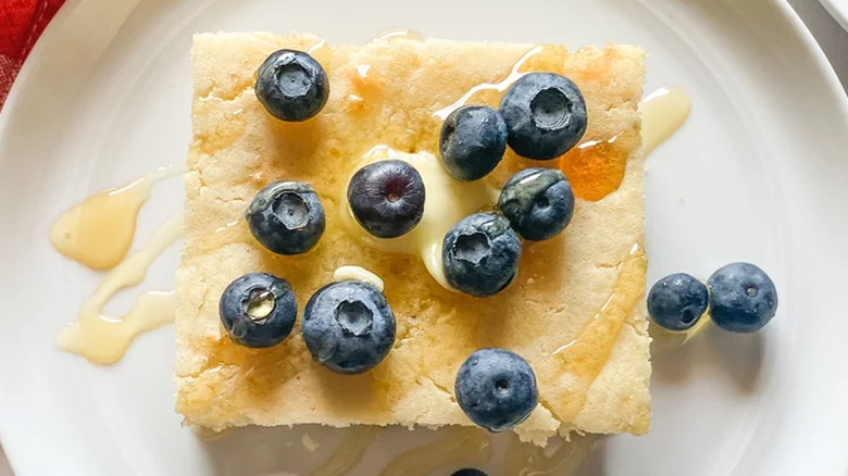 Square pancake with blueberries and syrup