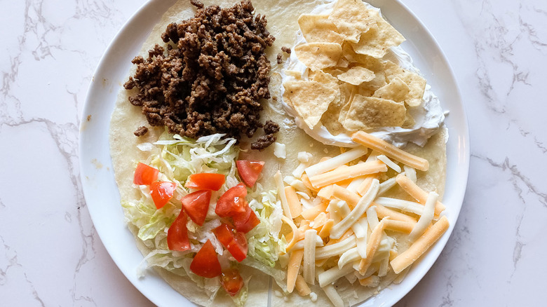 Partially folded tortilla with fillings 