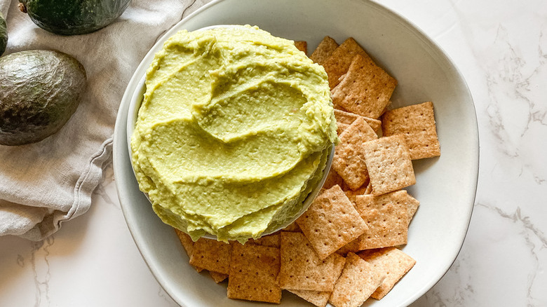 avocado hummus with crackers