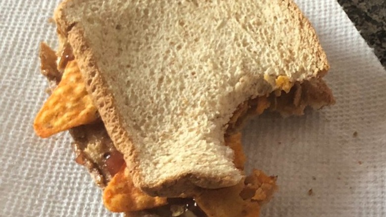 Peanut butter & jelly sandwich with Doritos