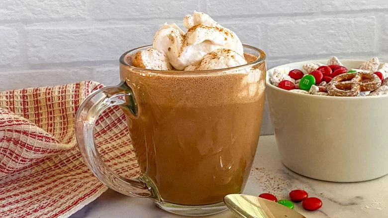 A mug of hot chocolate with whipped cream