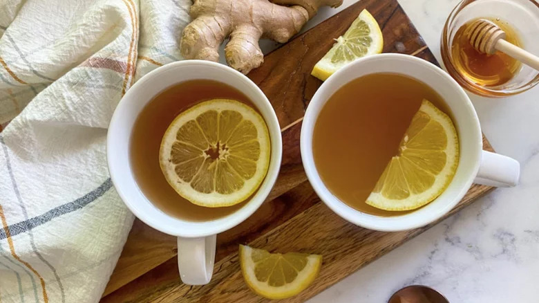 Two cups of tea with lemons