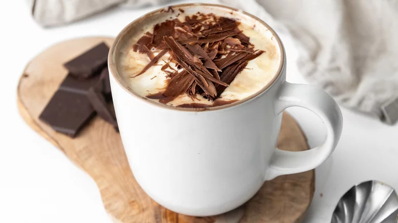 A mug of hot chocolate with chocolate shavings