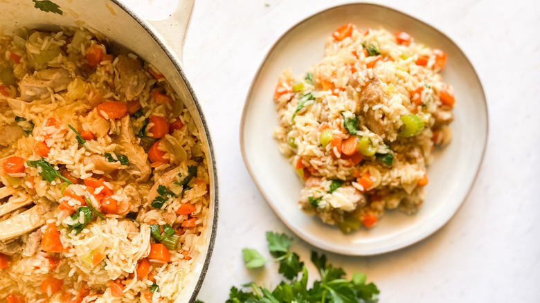 Chicken and rice in pot and on plate