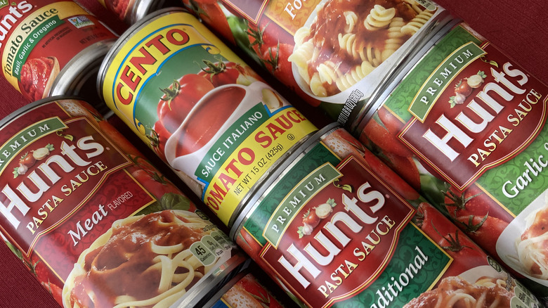 arrangement of spaghetti sauce cans