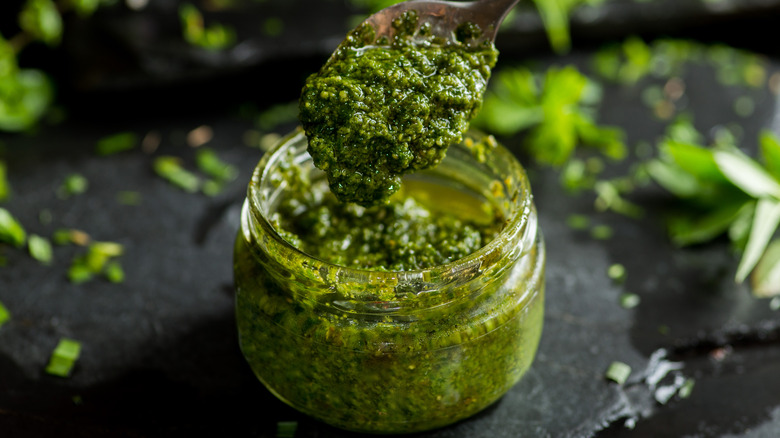 Ground basil into pesto