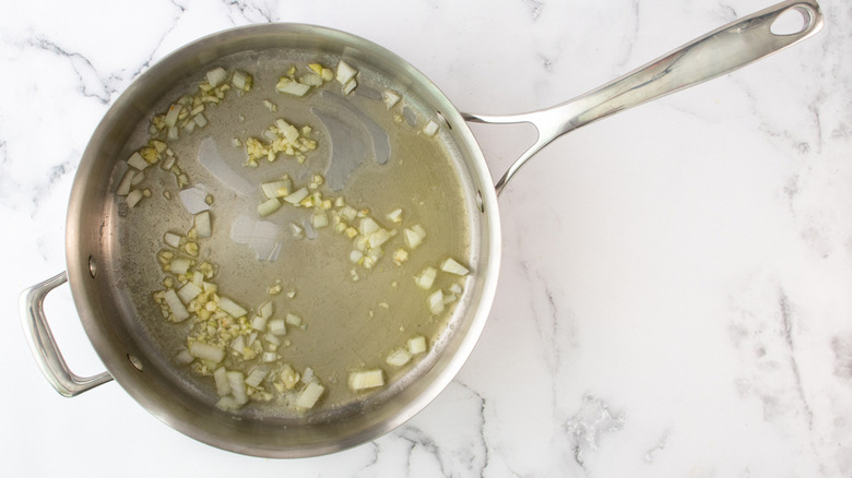 onions and garlic in pan