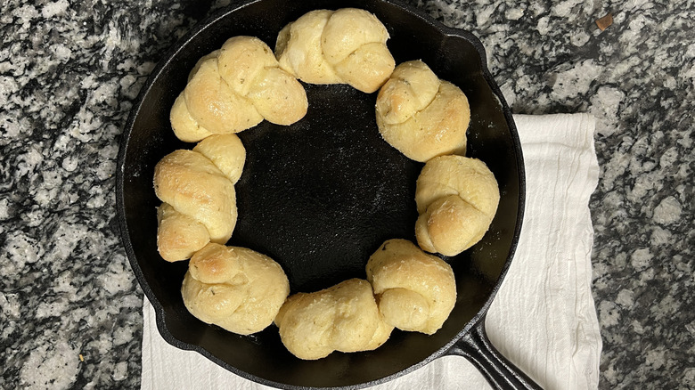 bread knots in a black frying pan