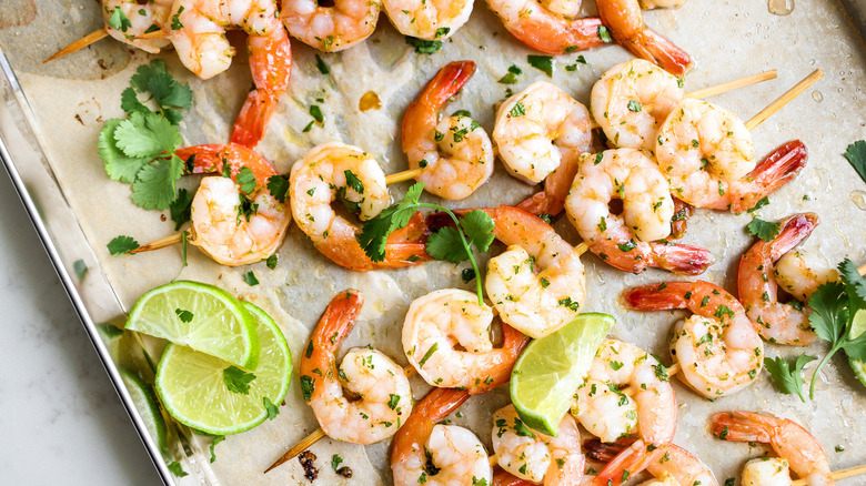 shrimp skewers on pan