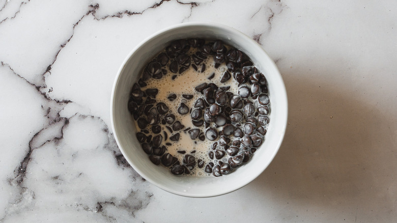 chocolate chips and cream in bowl