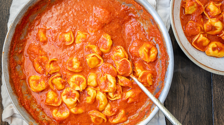 creamy tomato tortellini in skillet