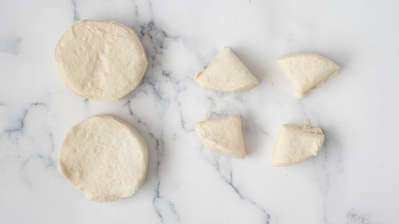 quartered biscuit dough