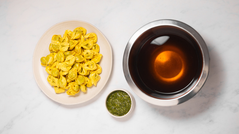 pesto tortellini and broth