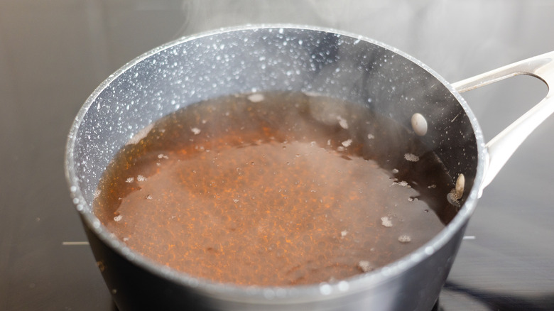 simmering broth in pot