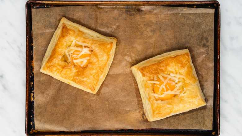 filled breakfast puffs on pan