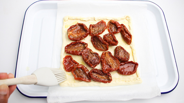 Puff pastry covered in tomatoes