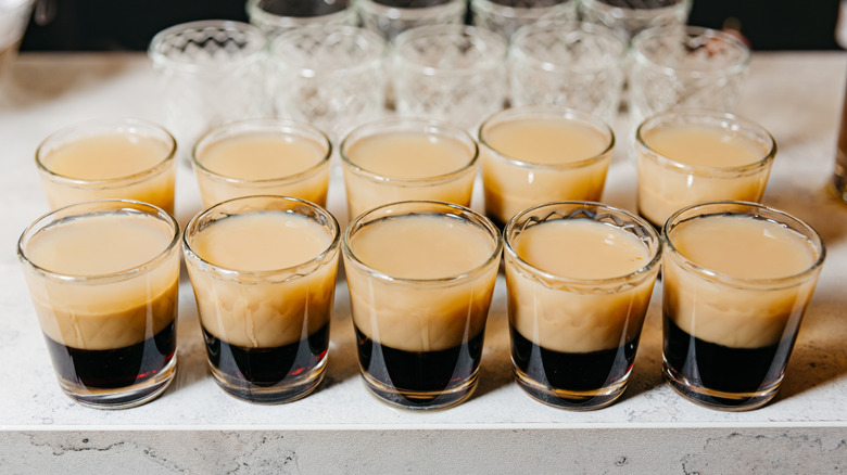 A group of ten mixed booze shots