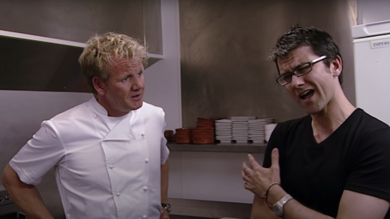 Gordon Ramsay and a chef on "Kitchen Nightmares"