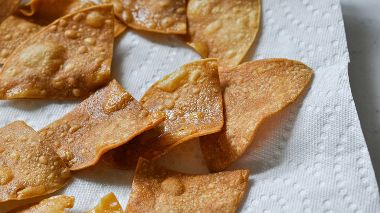 fried tortillas on paper towel 